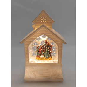 Julelanterne hvid kirke med Josef og Maria med Jesus barnet indeni