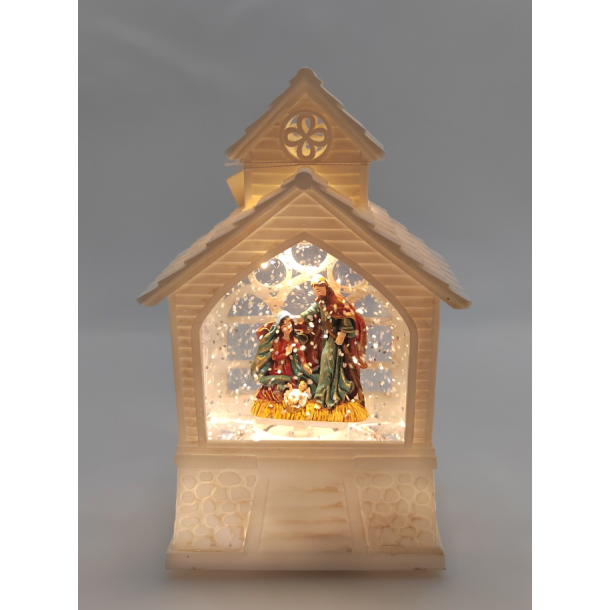 Julelanterne hvid kirke med Josef og Maria med Jesus barnet indeni